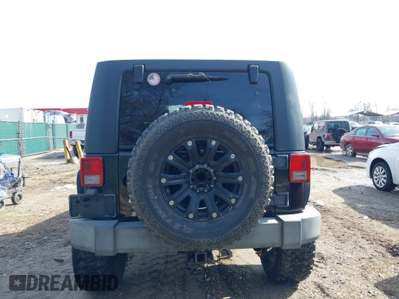 2008 Jeep Wrangler Unlimited Rubicon with VIN 1J8GA691X8L641959, listed as a IAAI auction lot 41586564 with 174,886 mi miles and . Bid and sale history available at DreamBid. Image 16.