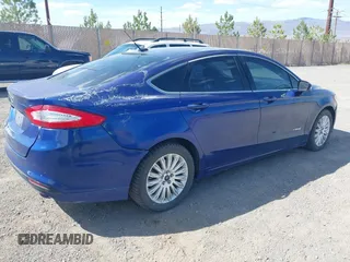 2014 Ford Fusion SE Hybrid with VIN 3FA6P0LUXER220053, listed as a IAAI auction lot 42229079 with 187,199 mi miles and . Bid and sale history available at DreamBid. Image 4.