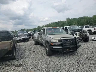 2001 Chevrolet Silverado 3500 LS z VIN 1GCJC33121F182199, wystawiony jako Copart lot #72530404 z przebiegiem 252 199 mil mil oraz Szkoda całkowita • Salvage title. Historia ofert i sprzedaży dostępna na DreamBid. Obrazek 12.