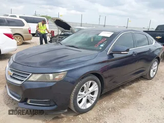 2014 Chevrolet Impala LT with VIN 2G1115SLXE9222573, listed as a IAAI auction lot 42119082 with 147,011 mi miles and . Bid and sale history available at DreamBid. Image 2.
