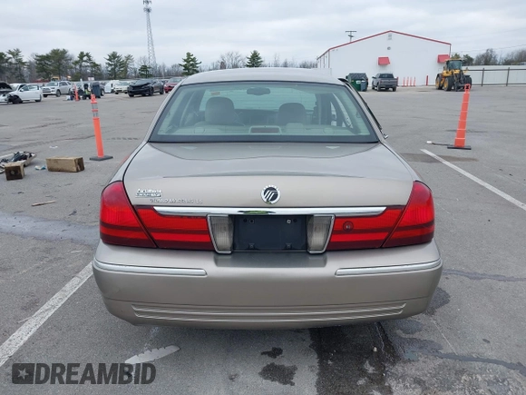 2004 Mercury Grand Marquis LS Premium z VIN 2MEFM75W14X643516, wystawiony jako IAAI lot #42007171 z przebiegiem 213 531 mil mil oraz . Historia ofert i sprzedaży dostępna na DreamBid. Obrazek 16.
