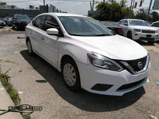 2019 Nissan Sentra SV z VIN 3N1AB7AP8KY202325, wystawiony jako IAAI lot #42438098 z przebiegiem 73 835 mil mil oraz . Historia ofert i sprzedaży dostępna na DreamBid. Obrazek 1.