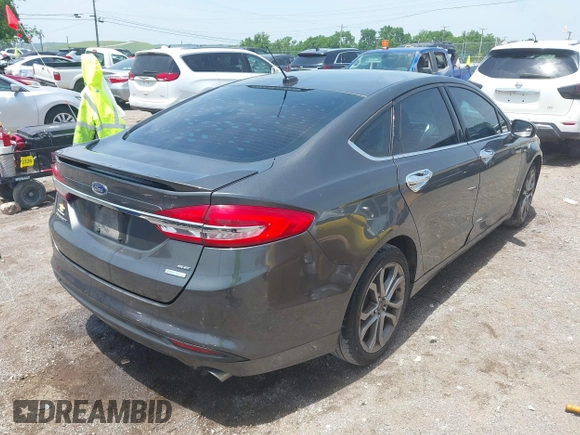 2017 Ford Fusion SE z VIN 3FA6P0HD3HR189144, wystawiony jako IAAI lot #42271155 z przebiegiem 172 146 mil mil oraz . Historia ofert i sprzedaży dostępna na DreamBid. Obrazek 4.