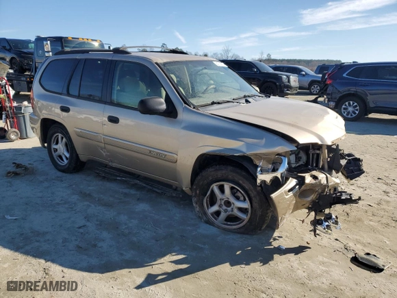 2004 GMC Envoy SLT with VIN 1GKDS13S442209545, listed as a Copart auction lot 84736874 with 255,371 mi miles and Salvage Title. Bid and sale history available at carsss.com. Image 4.