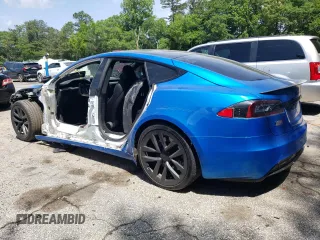 2021 Tesla Model S Plaid with VIN 5YJSA1E64MF438794, listed as a Copart auction lot 56903365 with 63,671 mi miles and Salvage title. Bid and sale history available at DreamBid. Image 2.