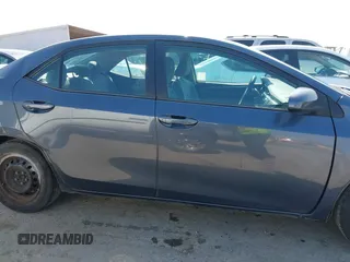 2016 Toyota Corolla L z VIN 5YFBURHE2GP430971, wystawiony jako IAAI lot #42429508 z przebiegiem 141 953 mil mil oraz . Historia ofert i sprzedaży dostępna na DreamBid. Obrazek 14.
