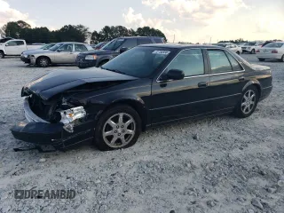 2001 Cadillac Seville Touring STS z VIN 1G6KY549X1U282930, wystawiony jako Copart lot #72750504 z przebiegiem Nie podano mil oraz Szkoda całkowita • Salvage title. Historia ofert i sprzedaży dostępna na DreamBid. Obrazek 1.