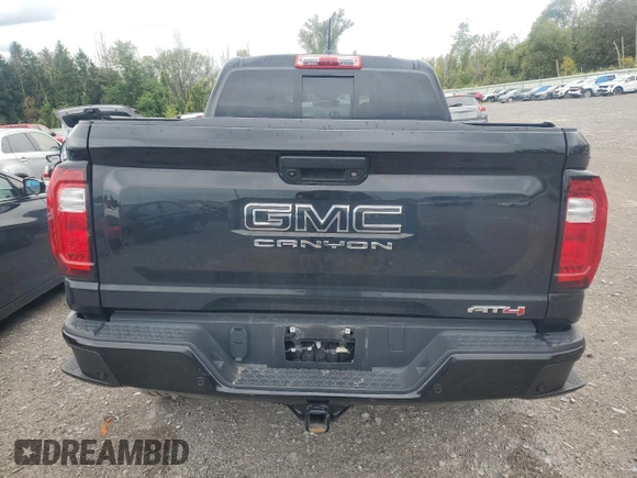 2023 GMC Canyon 4WD AT4 with VIN 1GTP6DEK8P1138775, listed as a Copart auction lot 70655754 with 0 mi miles and Salvage Title. Bid and sale history available at carsss.com. Image 6.