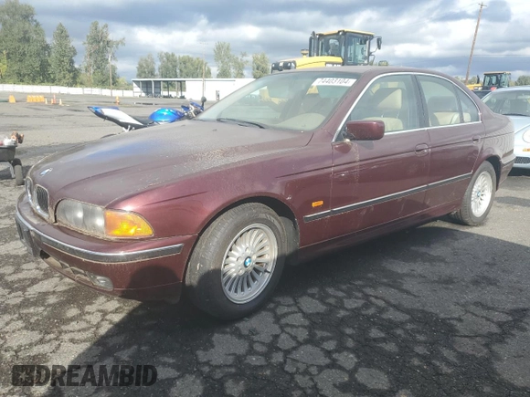 1997 BMW 5 Series 540i z VIN WBADE6320VBW54072, wystawiony jako Copart lot #74403104 z przebiegiem 98 910 mil mil oraz Czysty tytuł • Clean title. Historia ofert i sprzedaży dostępna na DreamBid. Obrazek 1.