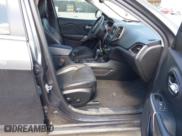 2021 Jeep Cherokee Latitude Lux with VIN 1C4PJMMX0MD235006, listed as a IAAI auction lot 42230915 with 76,264 mi miles and . Bid and sale history available at DreamBid. Image 5.
