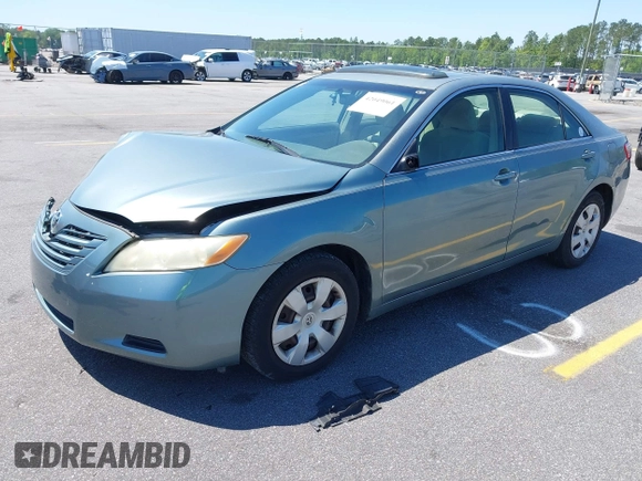 2007 Toyota Camry CE with VIN JTNBE46K773029333, listed as a IAAI auction lot 42049061 with 148,600 mi miles. Bid and sale history available at carsss.com. Image 2.