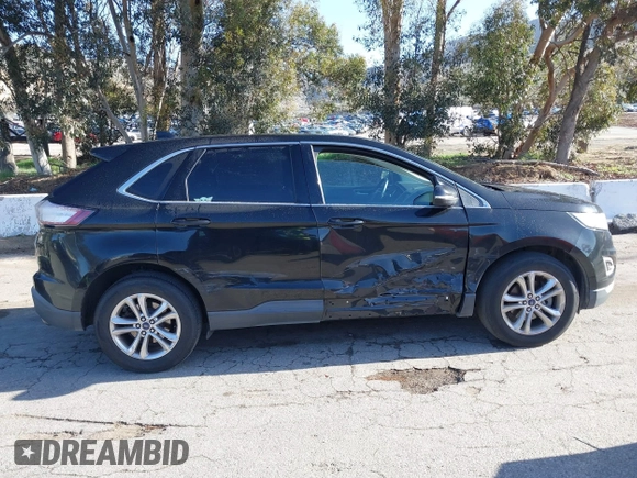 2015 Ford Edge SEL with VIN 2FMTK3J85FBB34115, listed as a IAAI auction lot 41813644 with 143,099 mi miles. Bid and sale history available at carsss.com. Image 13.