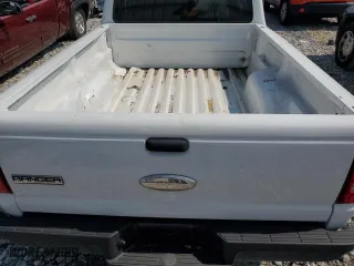 2011 Ford Ranger XL with VIN 1FTKR1ED8BPB06755, listed as a Copart auction lot 71007554 with 113,761 mi miles and Salvage Title. Bid and sale history available at carsss.com. Image 10.