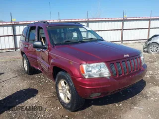 1999 Jeep Grand Cherokee Limited with VIN 1J4GW68N3XC770468, listed as a IAAI auction lot 41793600 with 65,277 mi miles. Bid and sale history available at carsss.com. Image 1.