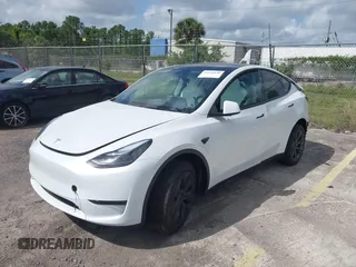 2025 Tesla Model Y Long Range with VIN 7SAYGDEE2SA337378, listed as a IAAI auction lot 41940840 with 1,676 mi miles and . Bid and sale history available at DreamBid. Image 18.