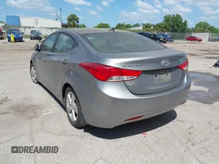 2012 Hyundai Elantra Limited with VIN KMHDH4AEXCU411894, listed as a IAAI auction lot 42068313 with 192,879 mi miles. Bid and sale history available at carsss.com. Image 3.