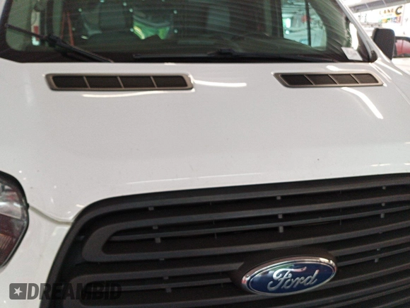 2016 Ford Transit Cargo z VIN 1FTYE1YM8GKB19172, wystawiony jako IAAI lot #42788511 z przebiegiem 143 978 mil mil oraz . Historia ofert i sprzedaży dostępna na DreamBid. Obrazek 8.