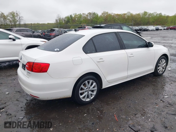 2011 Volkswagen Jetta Sedan SE w/Convenience & Sunroof PZEV with VIN 3VWDZ7AJ4BM385356, listed as a IAAI auction lot 42012728 with 169,045 mi miles. Bid and sale history available at carsss.com. Image 4.