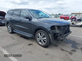 2013 Dodge Durango R/T z VIN 1C4SDJCT6DC695422, wystawiony jako IAAI lot #42136157 z przebiegiem 103 293 mil mil oraz . Historia ofert i sprzedaży dostępna na DreamBid. Obrazek 1.