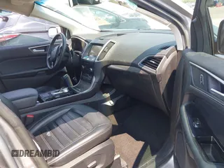 2020 Ford Edge SEL with VIN 2FMPK3J98LBA83828, listed as a IAAI auction lot 42585669 with 60,704 mi miles and . Bid and sale history available at DreamBid. Image 5.
