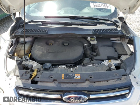 2013 Ford Escape SEL z VIN 1FMCU9H9XDUC15081, wystawiony jako Copart lot #58034165 z przebiegiem 166 612 mil mil oraz Szkoda całkowita • Salvage title. Historia ofert i sprzedaży dostępna na DreamBid. Obrazek 11.