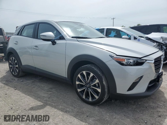 2019 Mazda CX-3 Touring z VIN JM1DKFC76K1451342, wystawiony jako Copart lot #58413935 z przebiegiem 21 391 mil mil oraz Szkoda całkowita • Salvage title. Historia ofert i sprzedaży dostępna na DreamBid. Obrazek 4.