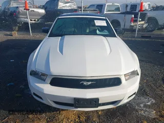 2012 Ford Mustang V6 with VIN 1ZVBP8EM0C5212707, listed as a IAAI auction lot 41775024 with 144,116 mi miles and . Bid and sale history available at carsss.com. Image 12.