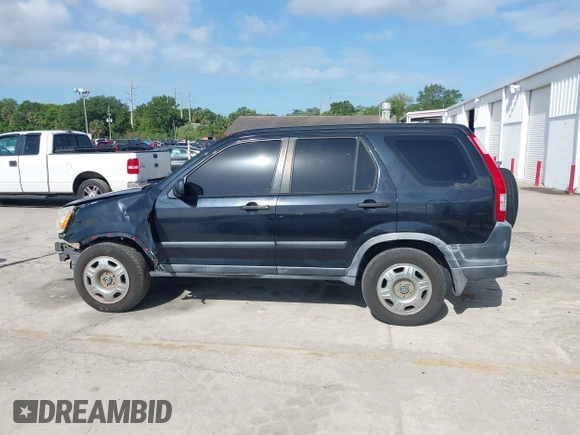 2005 Honda CR-V LX with VIN JHLRD78535C031868, listed as a IAAI auction lot 42002372 with 201,258 mi miles. Bid and sale history available at carsss.com. Image 15.