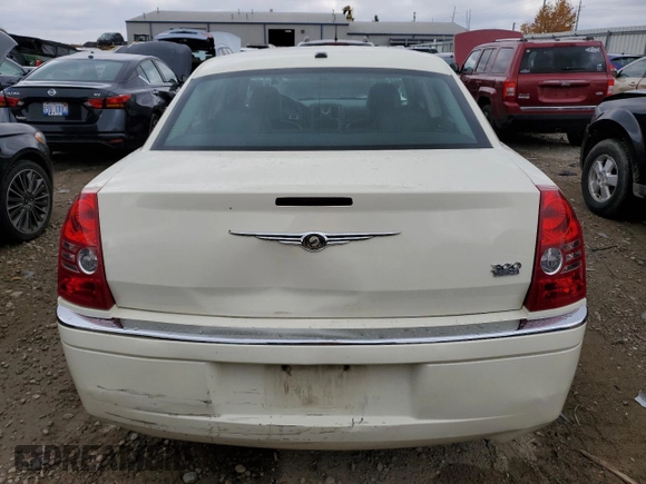 2009 Chrysler 300 Limited with VIN 2C3KA33V39H590917, listed as a Copart auction lot 77657054 with 180,613 mi miles and Clean Title. Bid and sale history available at carsss.com. Image 6.