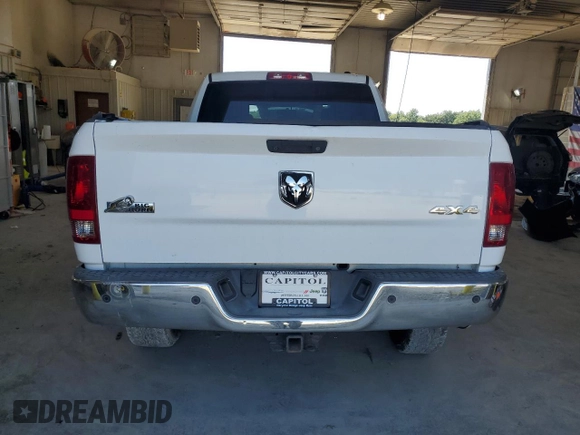 2012 Ram 2500 SLT with VIN 3C6TD5DT5CG112948, listed as a Copart auction lot 68581694 with 207,960 mi miles and Salvage title. Bid and sale history available at DreamBid. Image 6.