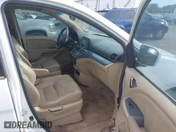 2007 Honda Odyssey EX-L with VIN 5FNRL38787B051582, listed as a IAAI auction lot 42104718 with 193,630 mi miles and . Bid and sale history available at DreamBid. Image 5.