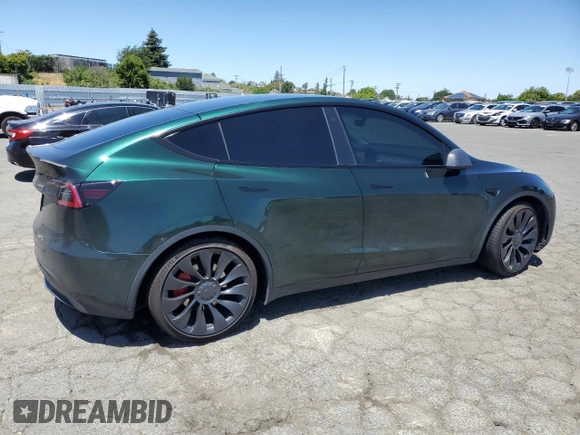 2022 Tesla Model Y Performance z VIN 7SAYGDEF2NF573979, wystawiony jako Copart lot #57778265 z przebiegiem 49 232 mil mil oraz Szkoda całkowita • Salvage title. Historia ofert i sprzedaży dostępna na DreamBid. Obrazek 3.