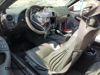 1999 Pontiac Firebird Formula z VIN 2G2FV22GXX2220910, wystawiony jako Copart lot #71288224 z przebiegiem Nie podano mil oraz Szkoda całkowita • Salvage title. Historia ofert i sprzedaży dostępna na DreamBid. Obrazek 7.