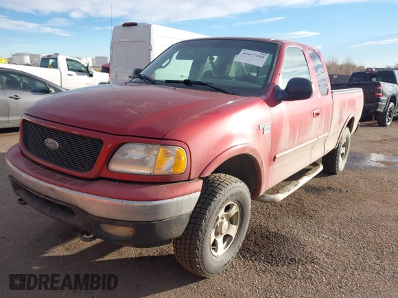 2001 Ford F-150 XL with VIN 1FTRX18L21NB46718, listed as a IAAI auction lot 41477101 with 156,702 mi miles. Bid and sale history available at carsss.com. Image 2.