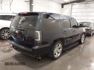 2007 Chevrolet Tahoe LS with VIN 1GNFC13C87R394003, listed as a IAAI auction lot 42206597 with 147,358 mi miles and . Bid and sale history available at DreamBid. Image 4.