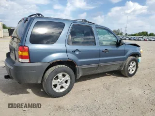 2006 Ford Escape XLT with VIN 1FMCU03196KA23467, listed as a Copart auction lot 56059295 with 162,314 mi miles and Salvage title. Bid and sale history available at DreamBid. Image 3.