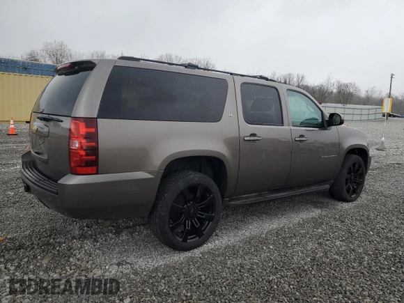 2013 Chevrolet Suburban LT with VIN 1GNSKJE77DR131188, listed as a Copart auction lot 52880375 with 147,278 mi miles and Salvage Title. Bid and sale history available at DreamBid. Image 3.