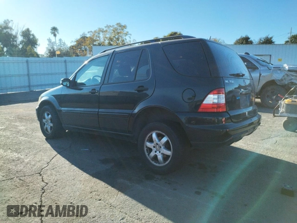 2003 Mercedes-Benz M-Class 3.7L with VIN 4JGAB57EX3A445949, listed as a Copart auction lot 74633744 with 223,427 mi miles and Salvage Title. Bid and sale history available at carsss.com. Image 2.