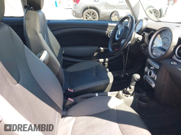 2008 MINI Hardtop with VIN WMWMF33548TT65118, listed as a IAAI auction lot 41819678 with 146,247 mi miles and . Bid and sale history available at DreamBid. Image 5.
