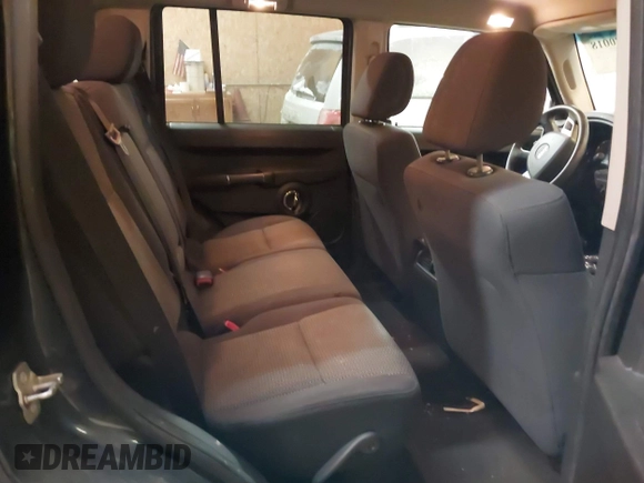2010 Jeep Commander Sport z VIN 1J4RG4GT4AC139097, wystawiony jako IAAI lot #41080018 z przebiegiem 214 735 mil mil oraz . Historia ofert i sprzedaży dostępna na DreamBid. Obrazek 8.