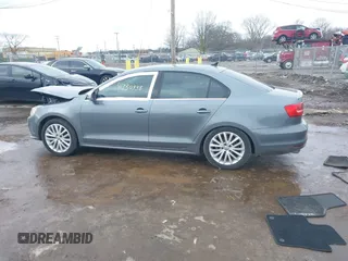 2015 Volkswagen Jetta Sedan 1.8T SE w/Connectivity with VIN 3VWD07AJ8FM260537, listed as a IAAI auction lot 41730338 with 155,724 mi miles. Bid and sale history available at carsss.com. Image 14.