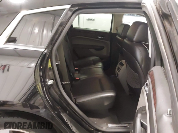 2011 Cadillac SRX Performance Collection with VIN 3GYFNEEY9BS675746, listed as a IAAI auction lot 41735676 with 113,079 mi miles and . Bid and sale history available at carsss.com. Image 8.