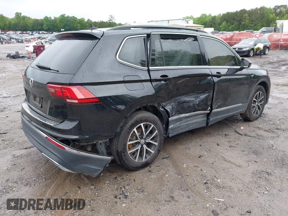2021 Volkswagen Tiguan SE with VIN 3VV3B7AX6MM021502, listed as a IAAI auction lot 42243705 with 60,988 mi miles and . Bid and sale history available at DreamBid. Image 4.
