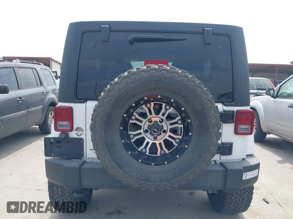 2018 Jeep Wrangler Unlimited Sahara with VIN 1C4HJWEG1JL801934, listed as a IAAI auction lot 42072968 with 112,432 mi miles and . Bid and sale history available at DreamBid. Image 16.