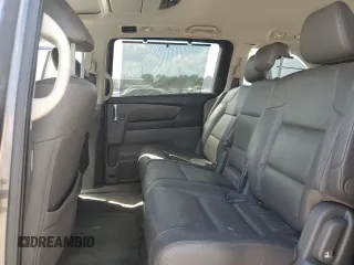 2014 Honda Odyssey Touring с VIN 5FNRL5H91EB005876, выставлен на аукционе Copart как лот 51446355 с пробегом 164 962 миль миль и Списание • Salvage title. История ставок и продаж доступна на DreamBid. Изображение 11.