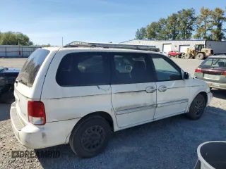 2002 Kia Sedona LX with VIN KNDUP131126201882, listed as a Copart auction lot 69361814 with 0 mi miles and Clean Title. Bid and sale history available at carsss.com. Image 3.