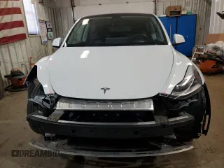 2023 Tesla Model Y Long Range z VIN 7SAYGDEE5PF619265, wystawiony jako Copart lot #48418655 z przebiegiem 42 233 mil mil oraz Szkoda całkowita • Salvage title. Historia ofert i sprzedaży dostępna na DreamBid. Obrazek 5.