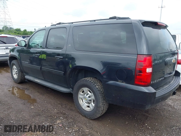 2011 Chevrolet Suburban with VIN 1GNWKMEG1BR374950, listed as a IAAI auction lot 42781182 with 304,690 mi miles and . Bid and sale history available at DreamBid. Image 3.