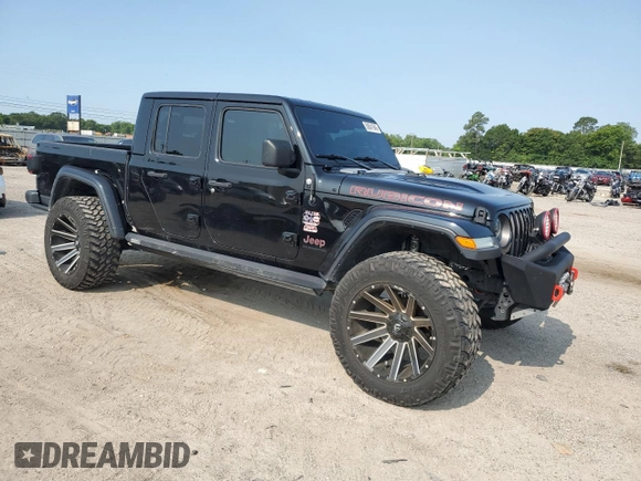 2020 Jeep Gladiator Rubicon with VIN 1C6JJTBG2LL166964, listed as a Copart auction lot 58041945 with 62,716 mi miles and Salvage title. Bid and sale history available at DreamBid. Image 4.