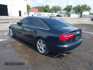 2014 Audi A6 Premium Plus with VIN WAUDFAFC7EN052529, listed as a IAAI auction lot 42667659 with 143,668 mi miles and . Bid and sale history available at DreamBid. Image 3.
